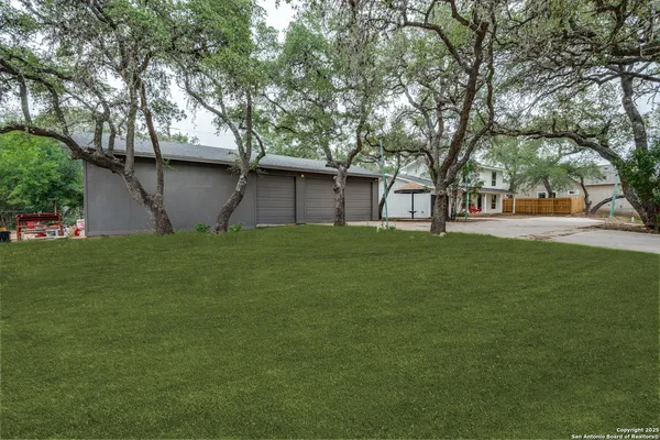 a house view with a garden space