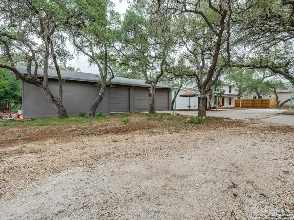 a house with trees in front of it