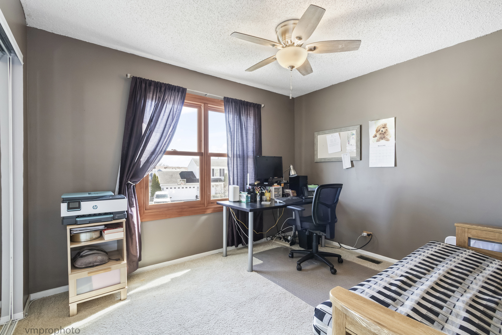 832 Kansas Street Carol Stream, IL 60188 - Photo 15 of 26 a view of a workspace with furniture and a window