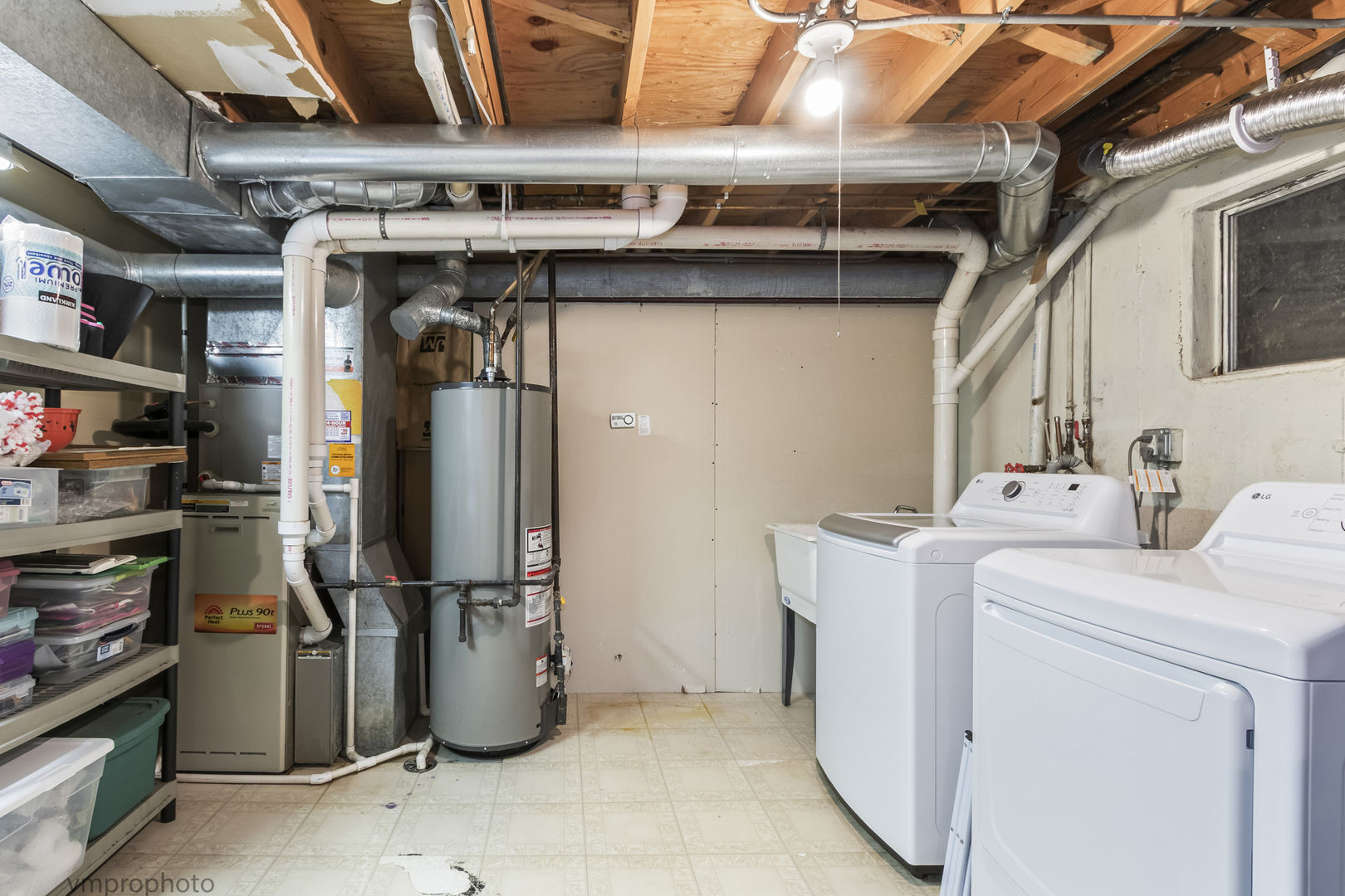 832 Kansas Street Carol Stream, IL 60188 - Photo 19 of 26 a view of storage and utility room with washer and dryer