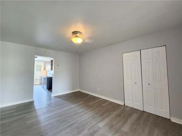 a view of a livingroom with wooden floor