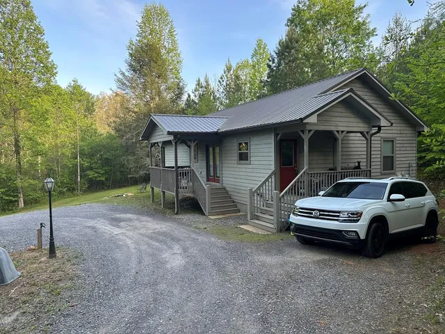 a car parked in front of a house