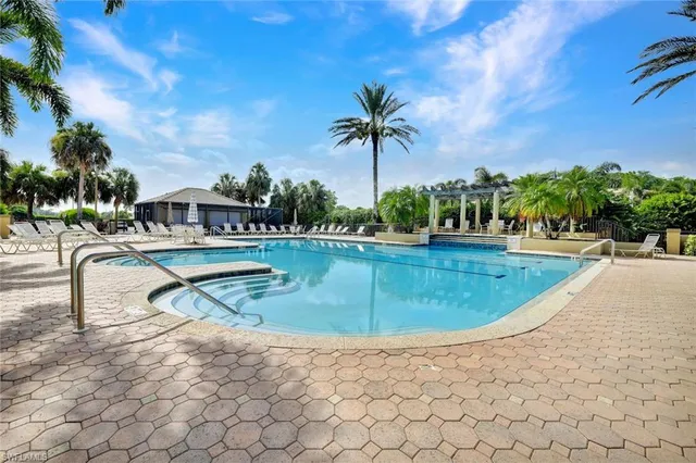 a view of a swimming pool with a slide
