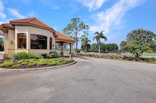 front view of a house with a garden