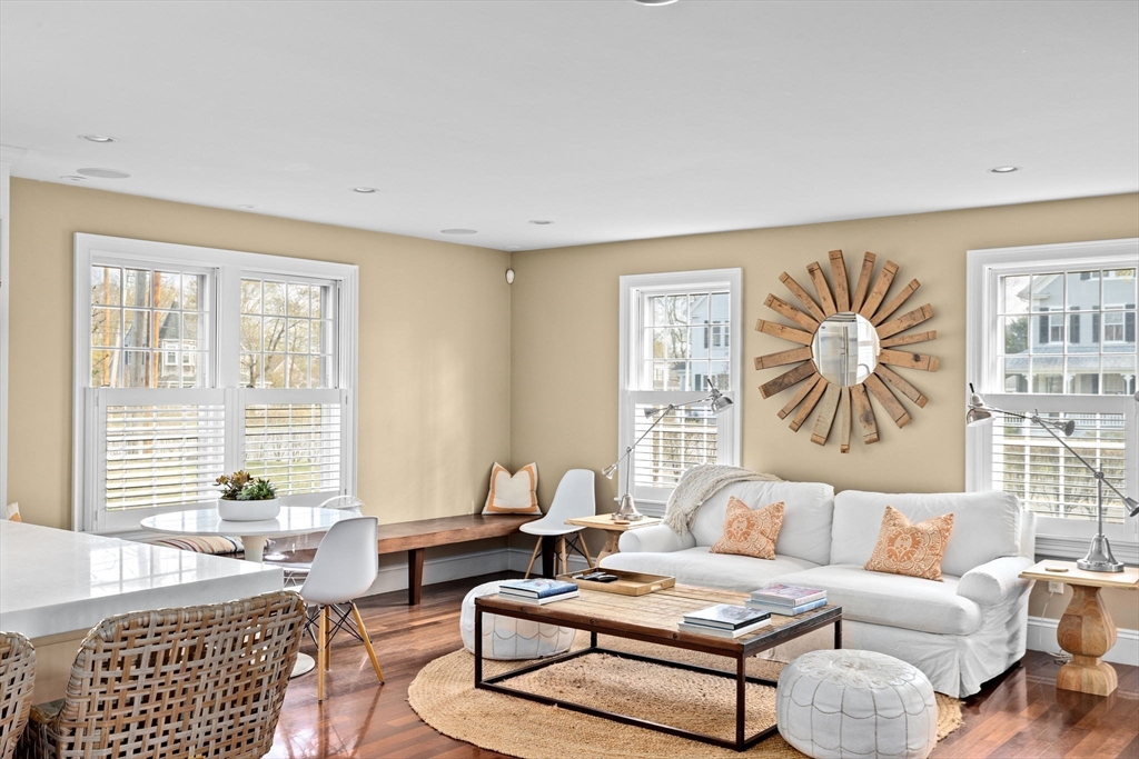 50 Pleasant Street Hingham, MA 02043 - Photo 12 of 41 a living room with furniture and a large window