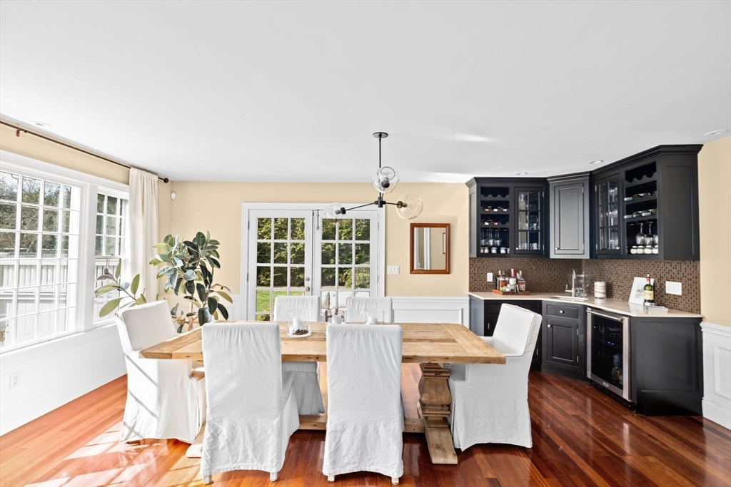 50 Pleasant Street Hingham, MA 02043 - Photo 17 of 41 a view of a dining room with furniture window and wooden floor