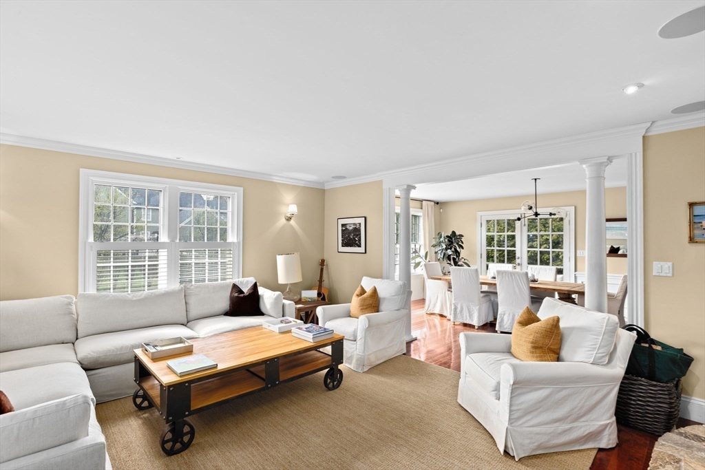 50 Pleasant Street Hingham, MA 02043 - Photo 19 of 41 a living room with furniture and a large window