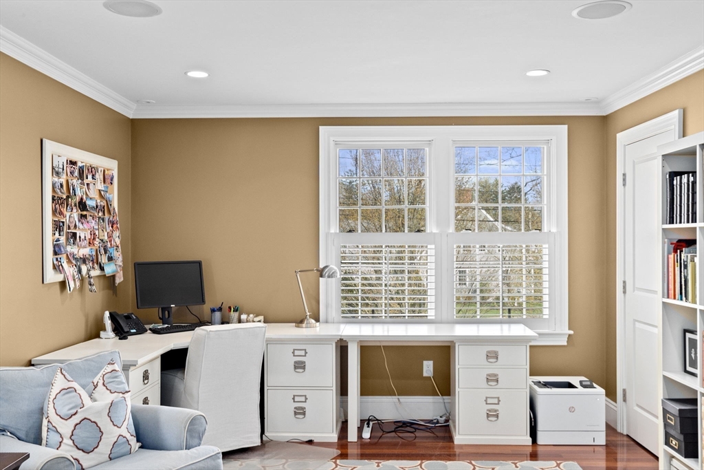 50 Pleasant Street Hingham, MA 02043 - Photo 23 of 41 a living room with furniture and a flat screen tv