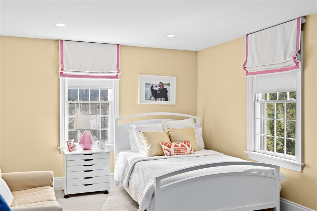 50 Pleasant Street Hingham, MA 02043 - Photo 30 of 41 a bedroom with a bed and a couch