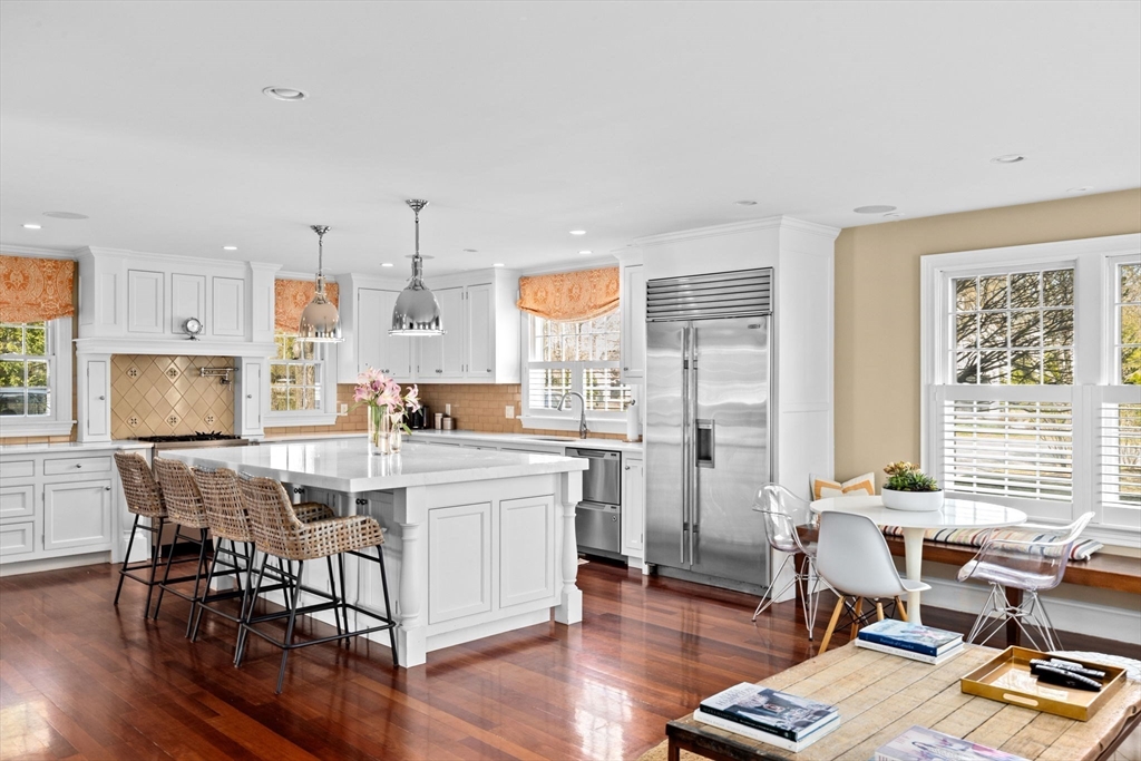 50 Pleasant Street Hingham, MA 02043 - Photo 6 of 41 a view of a dining room with furniture window and wooden floor