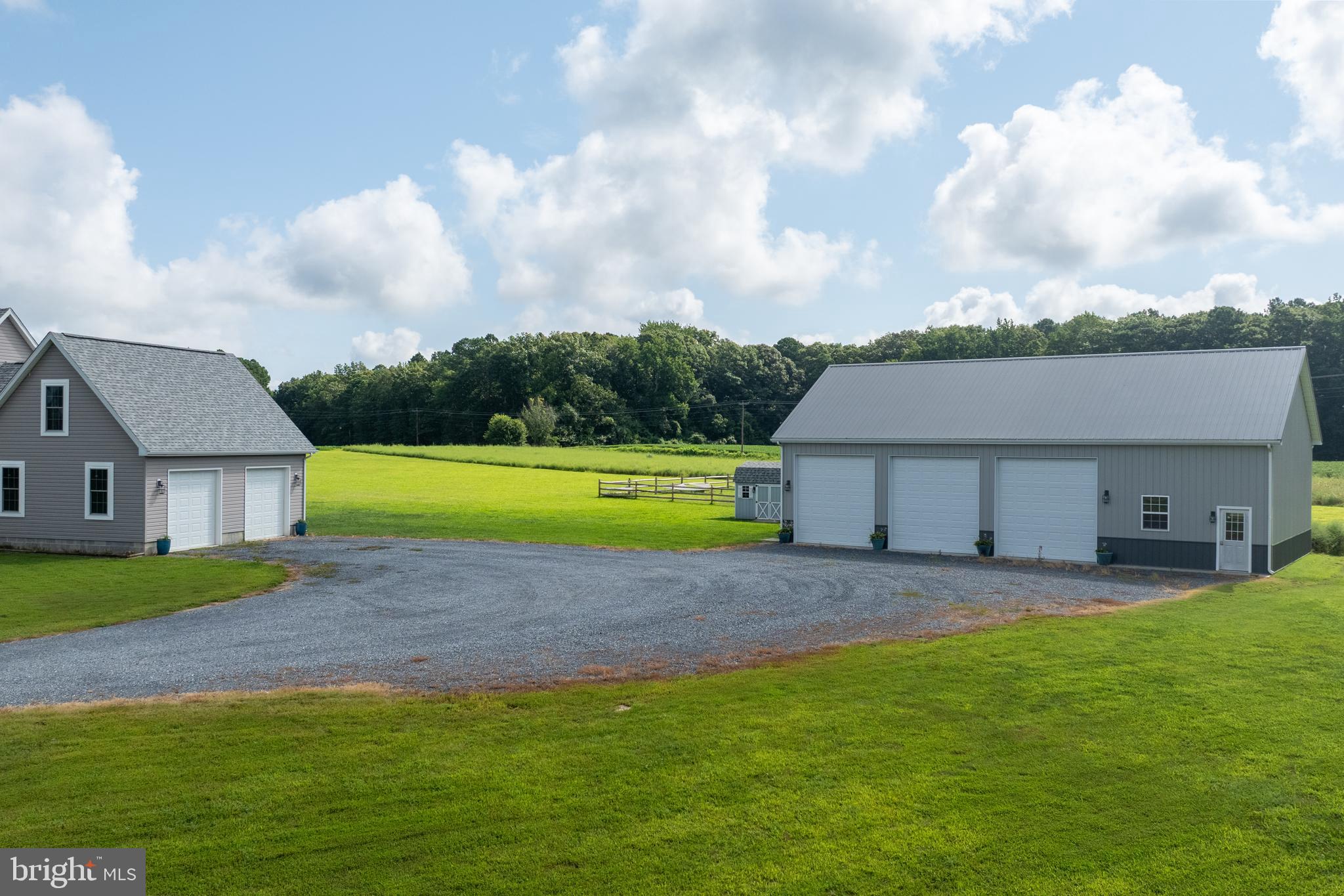 29862 Paddock Lane Easton, MD 21601 - Photo 15 of 83 a view of a house with a big yard and large trees