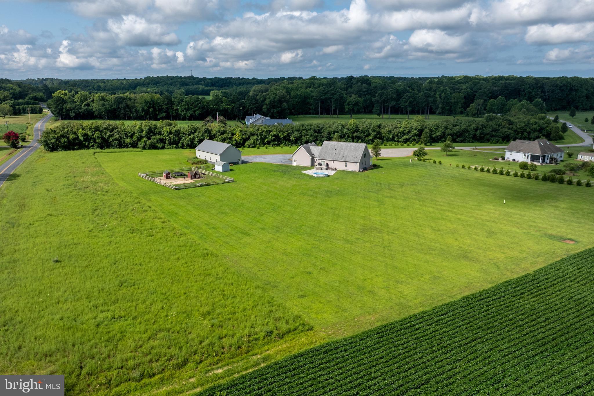 29862 Paddock Lane Easton, MD 21601 - Photo 18 of 83 a view of a lake with houses in the back