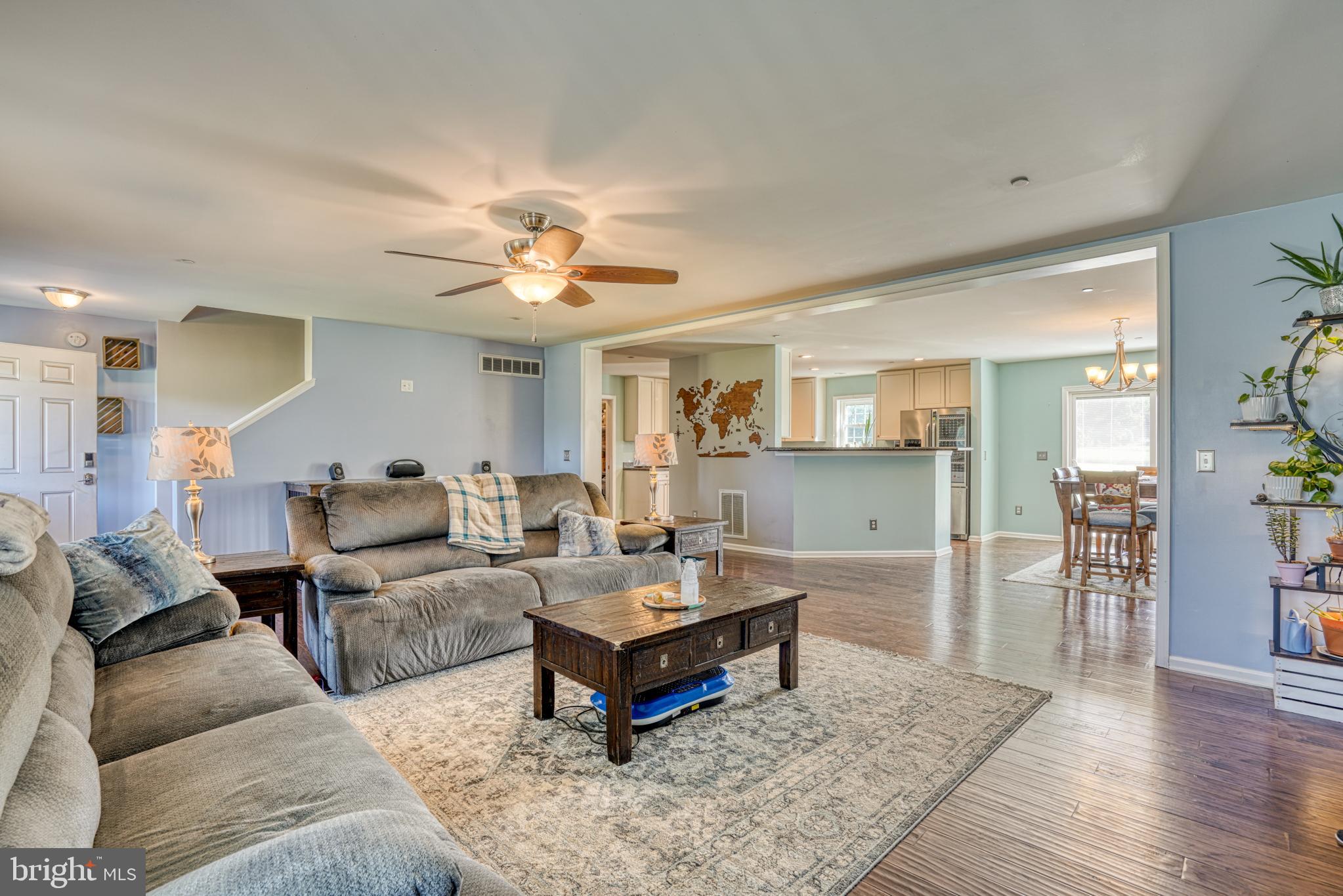 29862 Paddock Lane Easton, MD 21601 - Photo 25 of 83 a living room with furniture and wooden floor