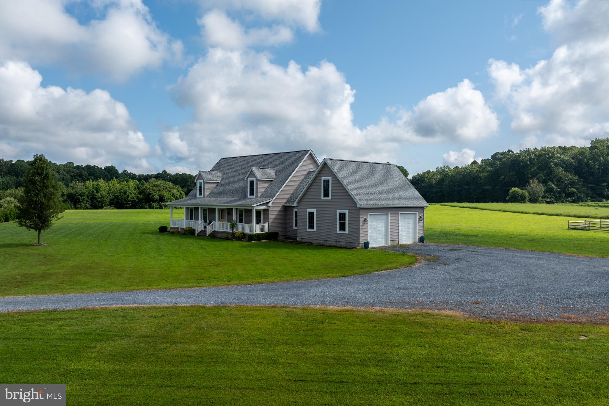 29862 Paddock Lane Easton, MD 21601 - Photo 4 of 83 a view of a big house with a big yard and large trees