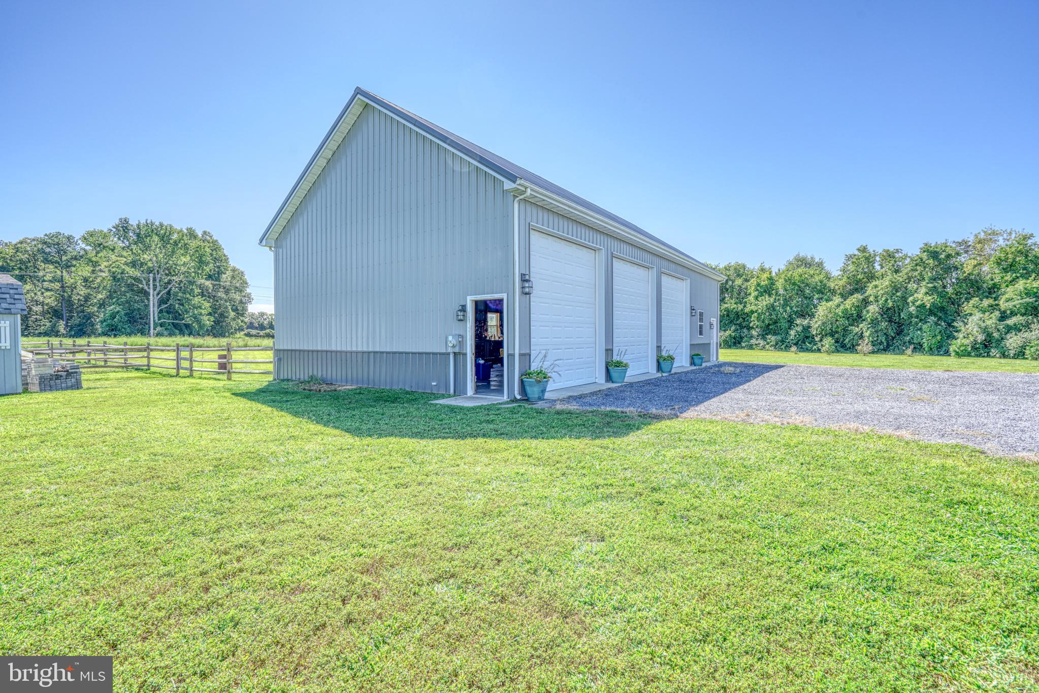 29862 Paddock Lane Easton, MD 21601 - Photo 74 of 83 a view of a backyard with a garden and entertaining space