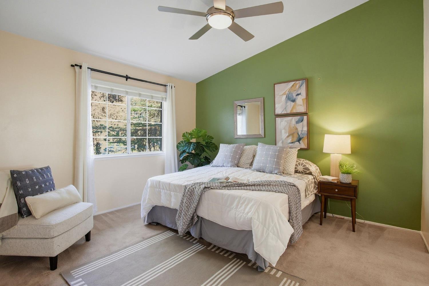 11150 Trinity River Drive, Unit 124 Rancho Cordova, CA 95670 - Photo 13 of 29 Master bath with fancy accent wall color and new fan.