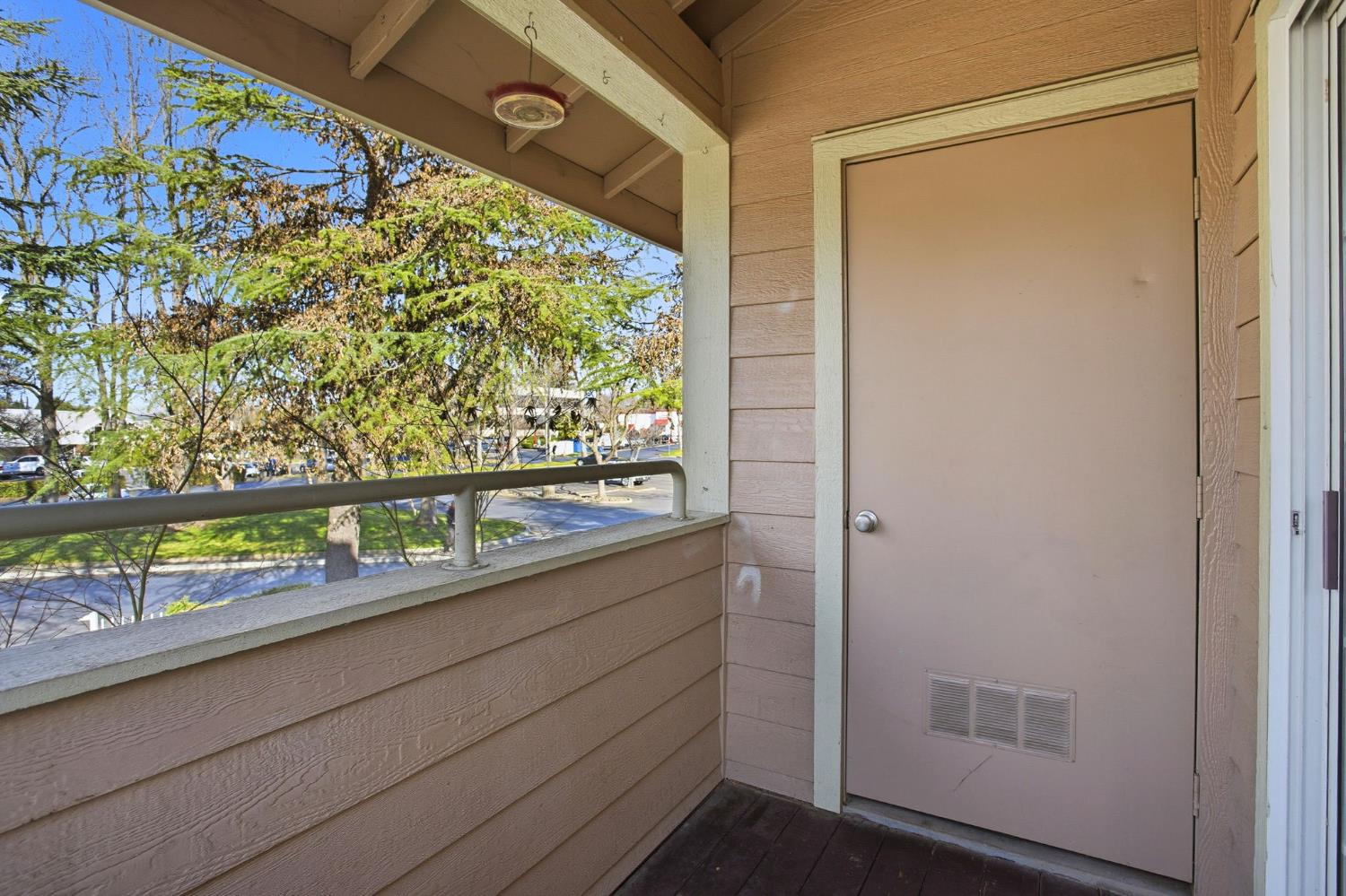 11150 Trinity River Drive, Unit 124 Rancho Cordova, CA 95670 - Photo 5 of 29 The shed on the covered deck houses the newer furnace and water heater.