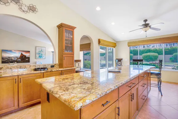 a living room with furniture fireplace and flat screen tv