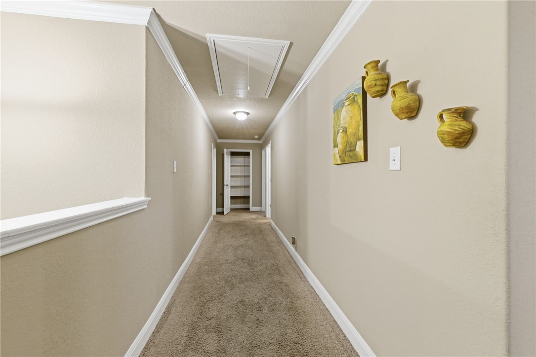8826 Virginia Rye San Antonio, TX 78254 - Photo 27 of 40 a view of hallway with windows