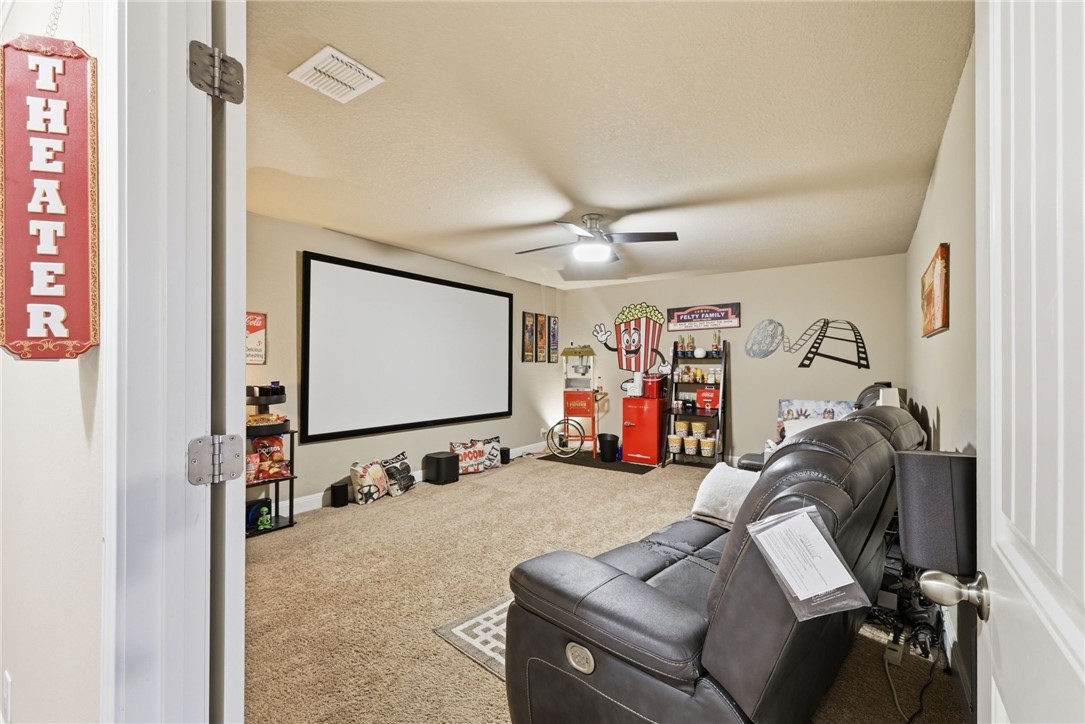 8826 Virginia Rye San Antonio, TX 78254 - Photo 33 of 40 a room with furniture and a flat screen tv