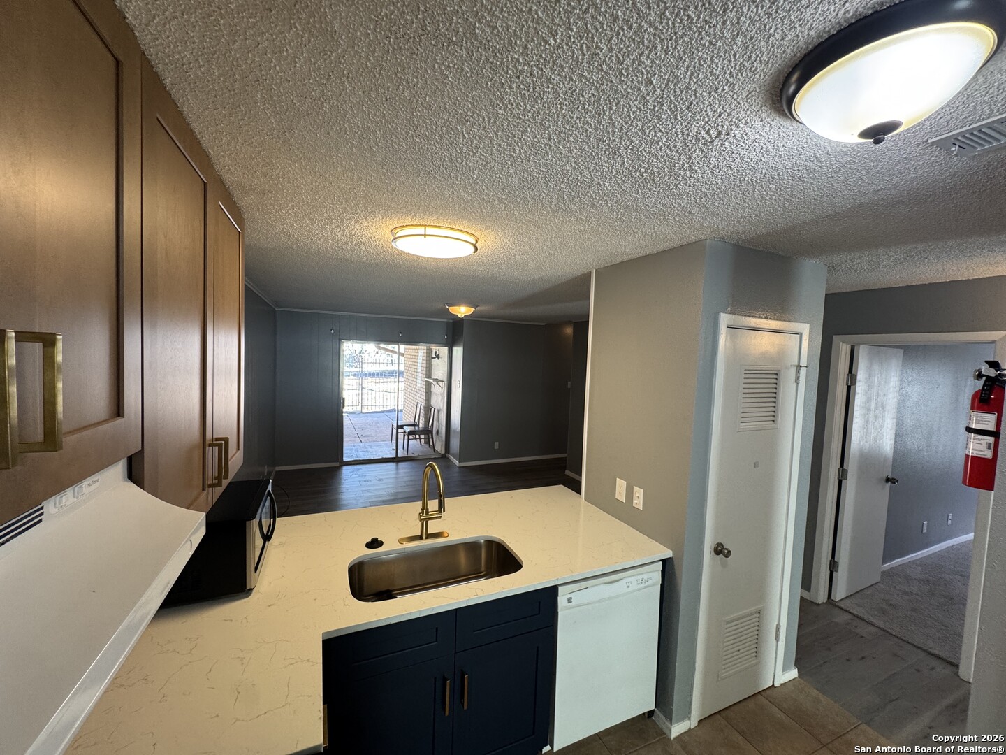 5019 Concord Ridge San Antonio, TX 78228 - Photo 3 of 19 a bathroom with a sink and a mirror