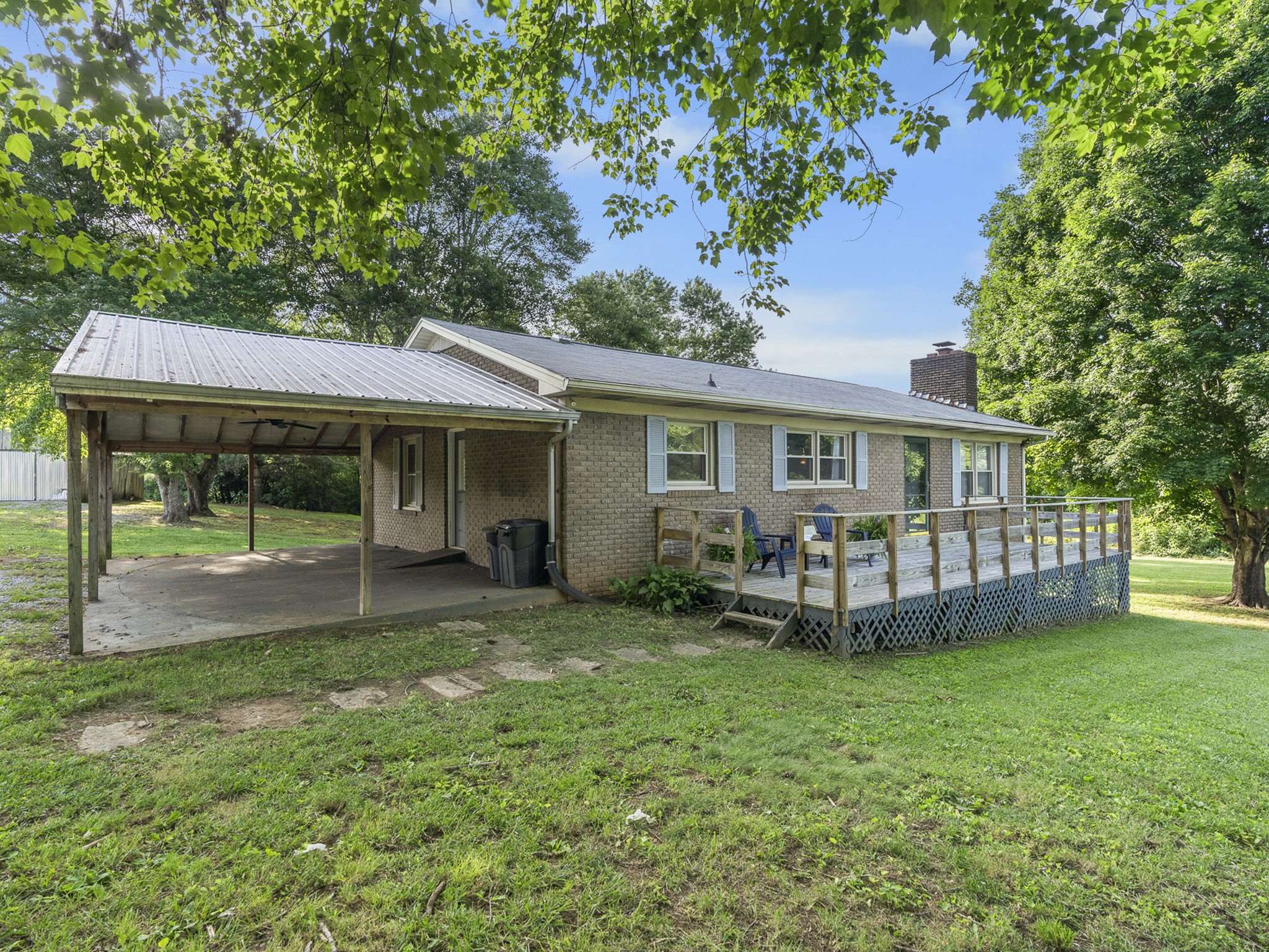 2502 Sullivan Knowles Road Sparta, TN 38583 - Photo 1 of 45 a view of a house with a yard and sitting area