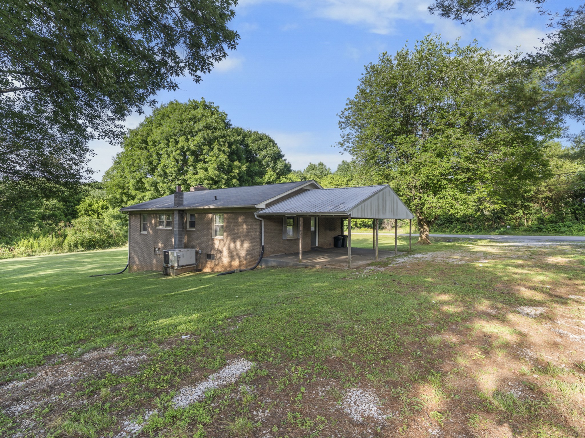 2502 Sullivan Knowles Road Sparta, TN 38583 - Photo 41 of 45 a view of a house with a yard
