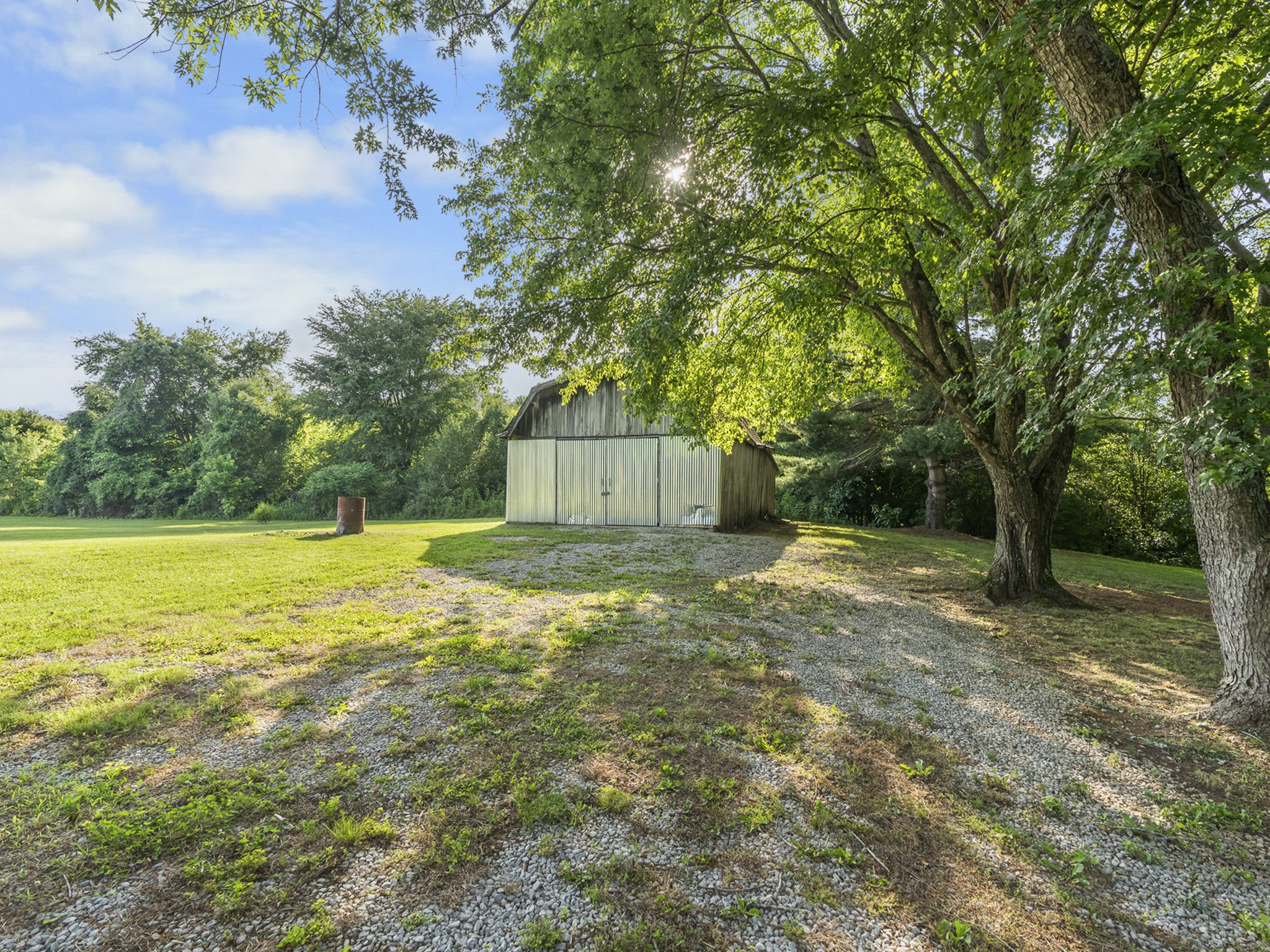 2502 Sullivan Knowles Road Sparta, TN 38583 - Photo 42 of 45 a view of a backyard with large trees