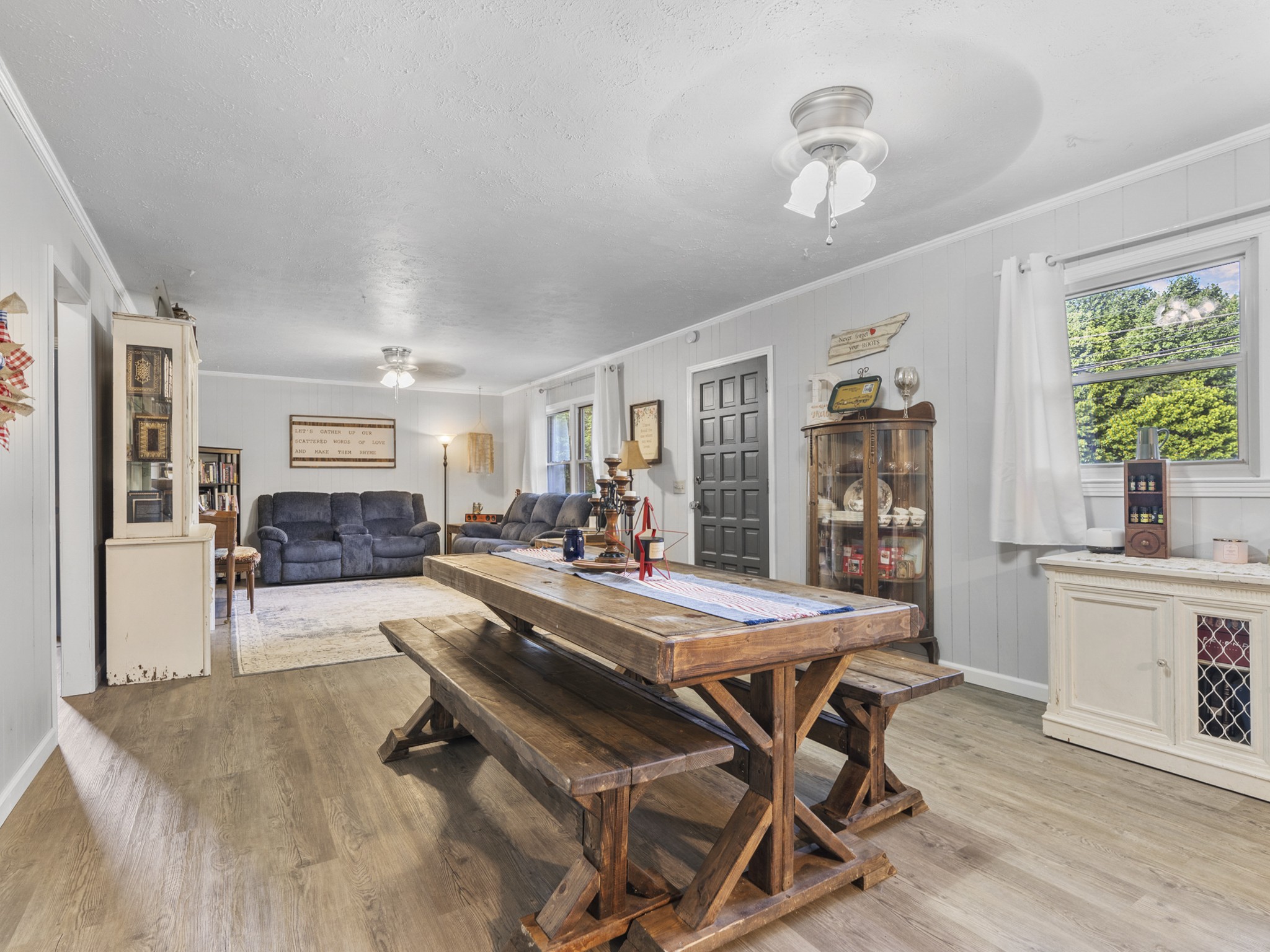 2502 Sullivan Knowles Road Sparta, TN 38583 - Photo 8 of 45 a view of a dining room with furniture window and wooden floor