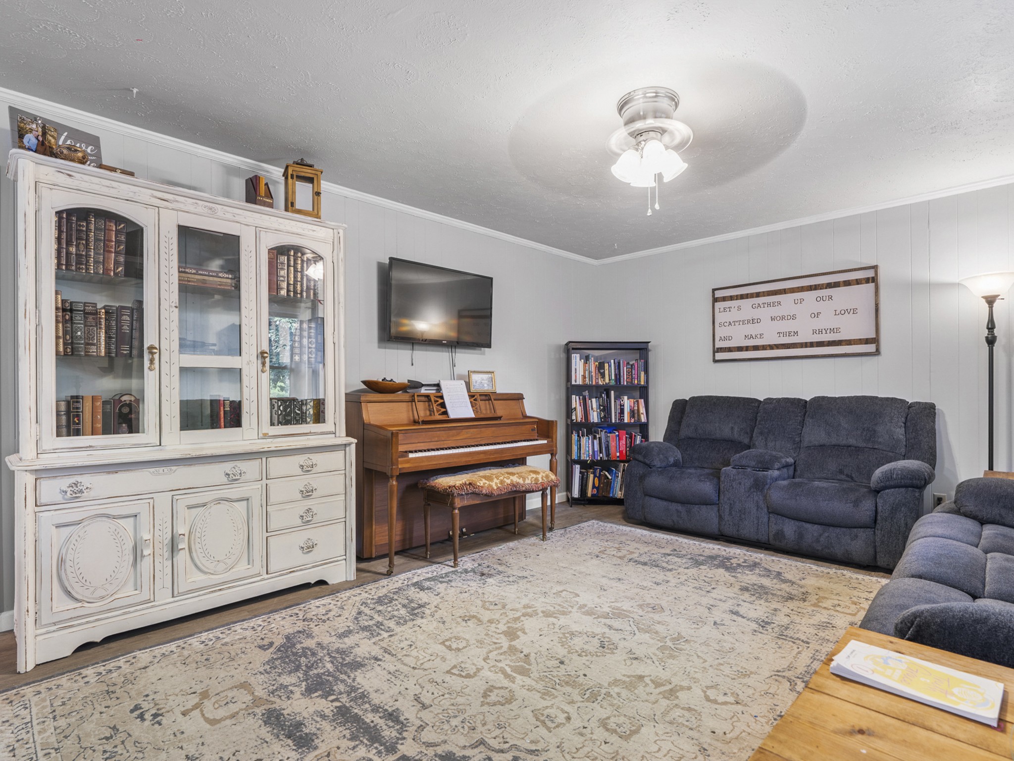 2502 Sullivan Knowles Road Sparta, TN 38583 - Photo 10 of 45 a living room with furniture and a flat screen tv