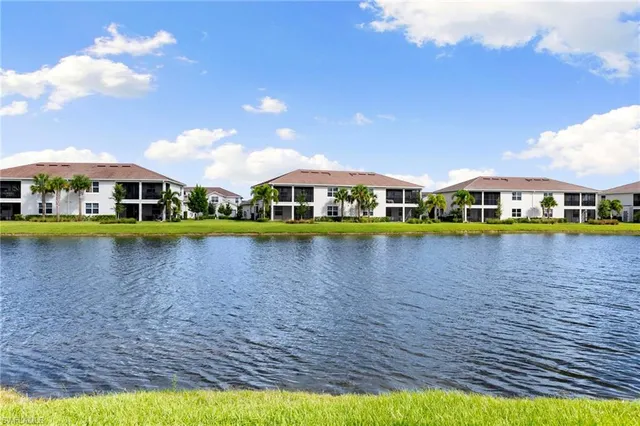 a view of a city with lawn chairs