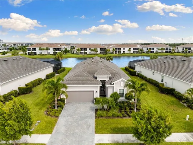 a front view of a house with a garage