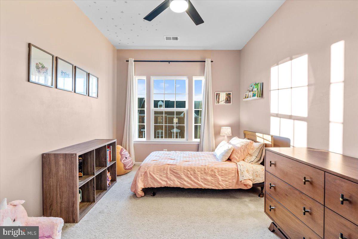 4535 Tinder Monrovia, MD 21770 - Photo 26 of 61 a bedroom with a bed and a window