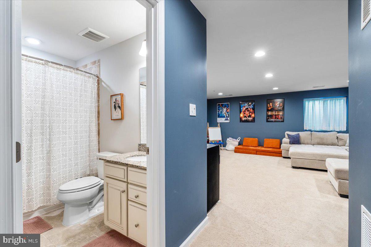 4535 Tinder Monrovia, MD 21770 - Photo 34 of 61 a living room with furniture and a toilet