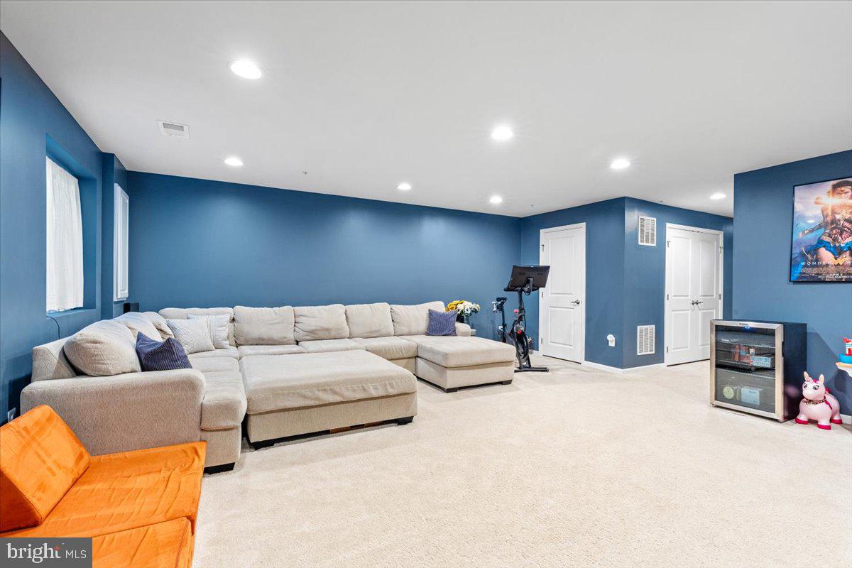 4535 Tinder Monrovia, MD 21770 - Photo 38 of 61 a living room with furniture and a flat screen tv