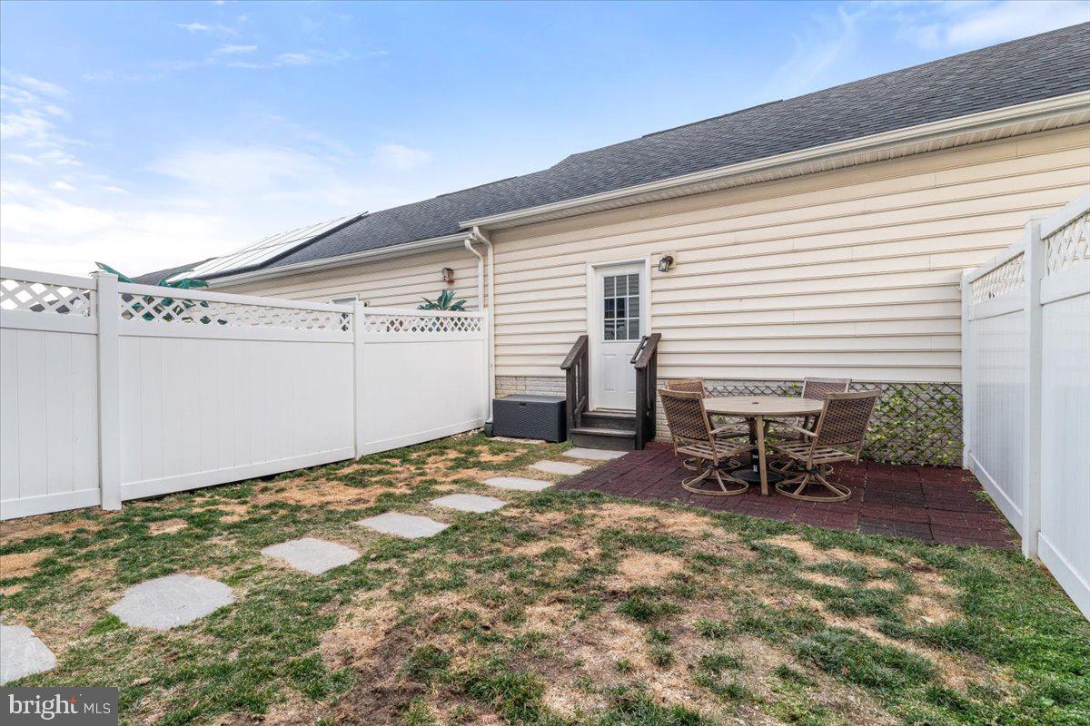 4535 Tinder Monrovia, MD 21770 - Photo 42 of 61 a backyard of a house with table and chairs
