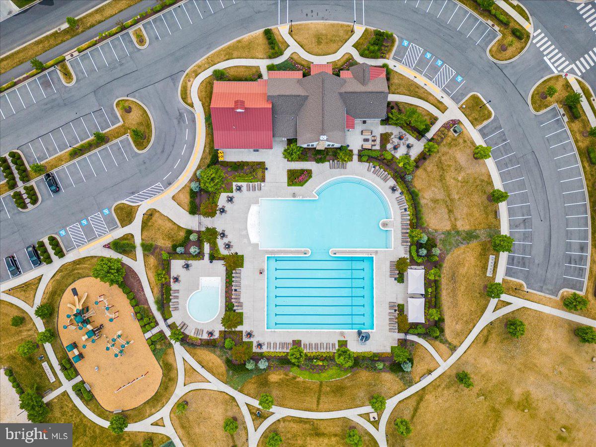 4535 Tinder Monrovia, MD 21770 - Photo 54 of 61 a view of a swimming pool with outdoor seating and yard