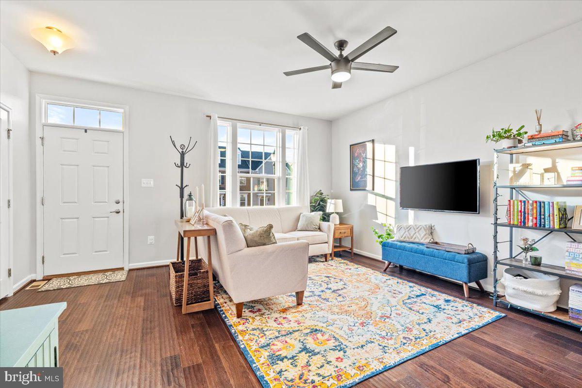4535 Tinder Monrovia, MD 21770 - Photo 6 of 61 a living room with furniture and a flat screen tv