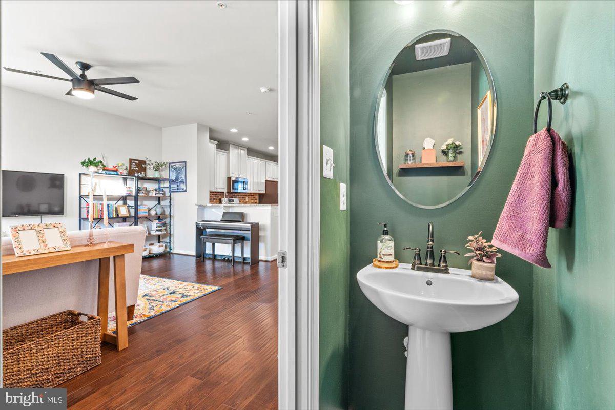 4535 Tinder Monrovia, MD 21770 - Photo 9 of 61 a bathroom with a sink and a mirror