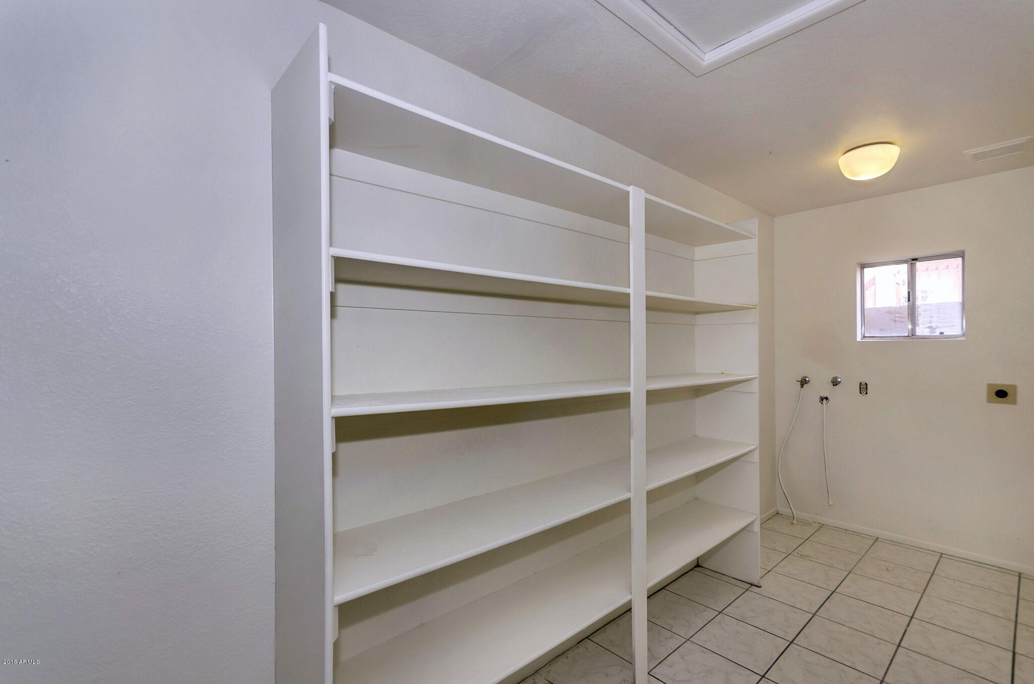 1524 East Fremont Road Phoenix, AZ 85042 - Photo 14 of 17 GRAND AND SPACIOUS LAUNDRY ROOM