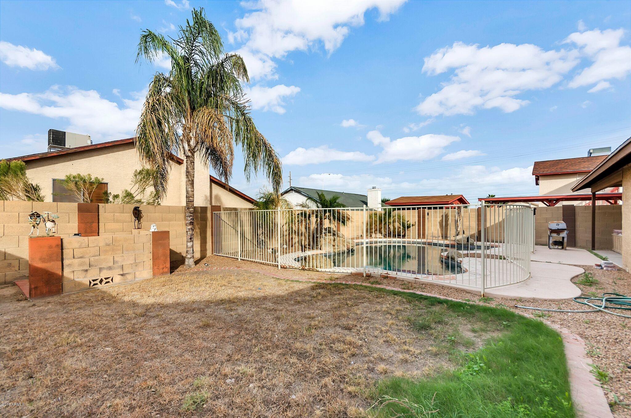 1524 East Fremont Road Phoenix, AZ 85042 - Photo 16 of 17 GRASSY REAR YARD