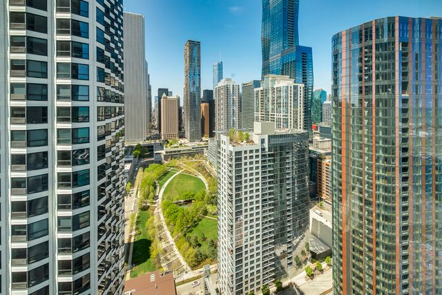 a view of a city with tall buildings