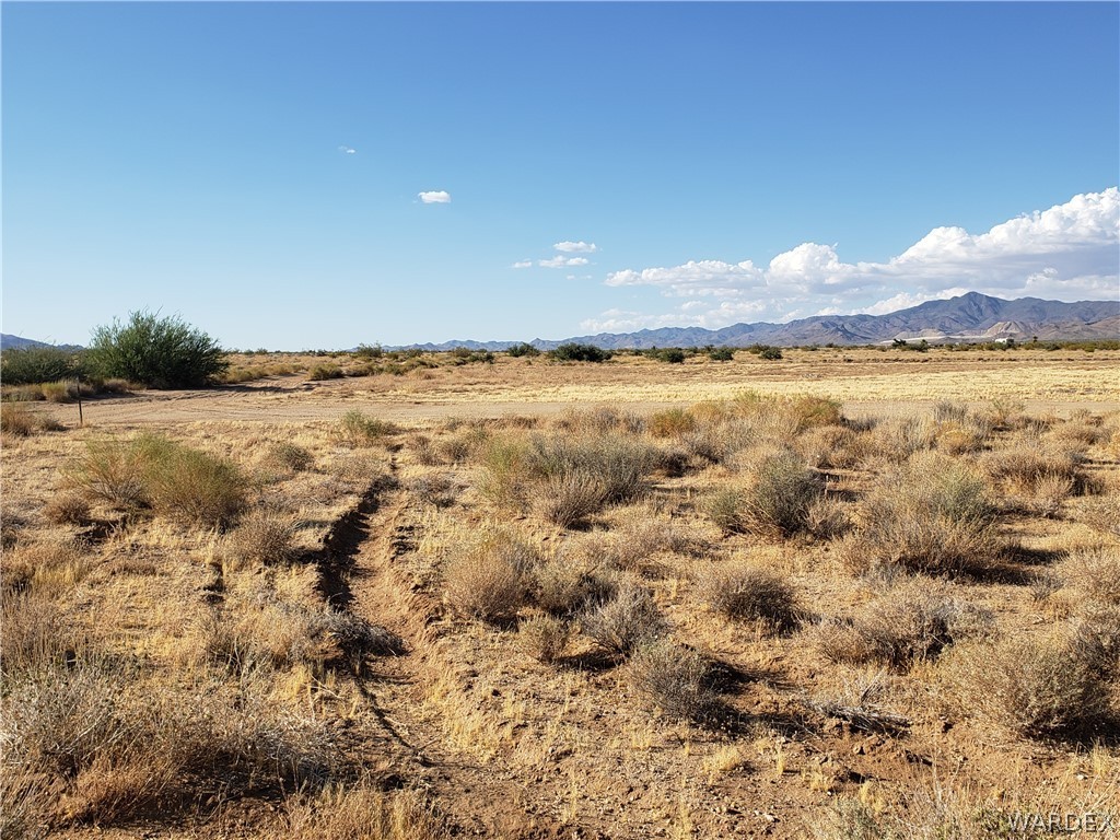 3884 Adobe Road Golden Valley, AZ 86413 - Photo 3 of 12 a view of an ocean and beach