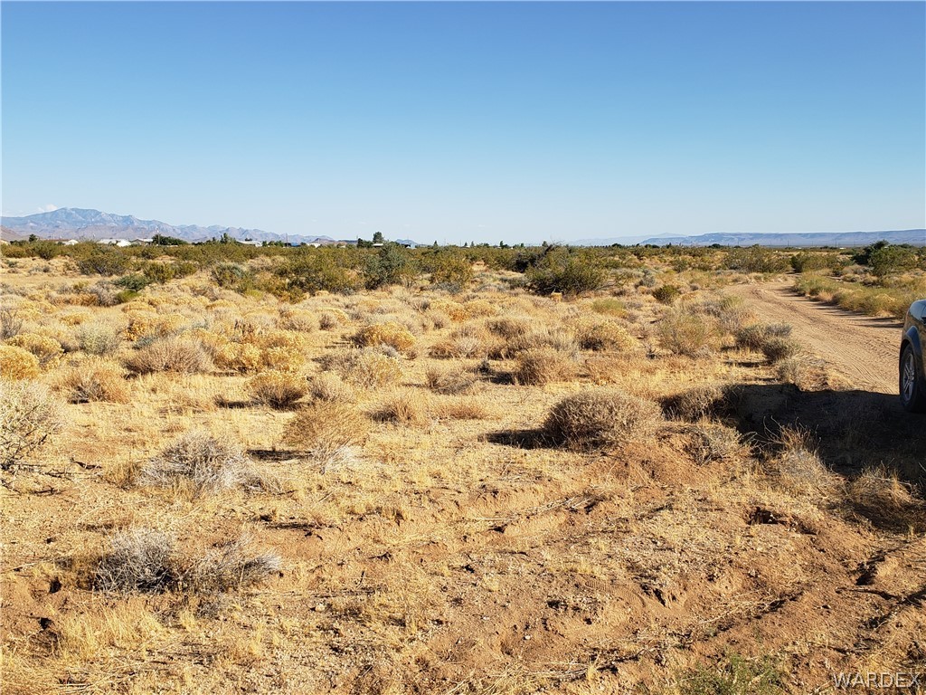 3884 Adobe Road Golden Valley, AZ 86413 - Photo 7 of 12 a view of ocean view with a mountain