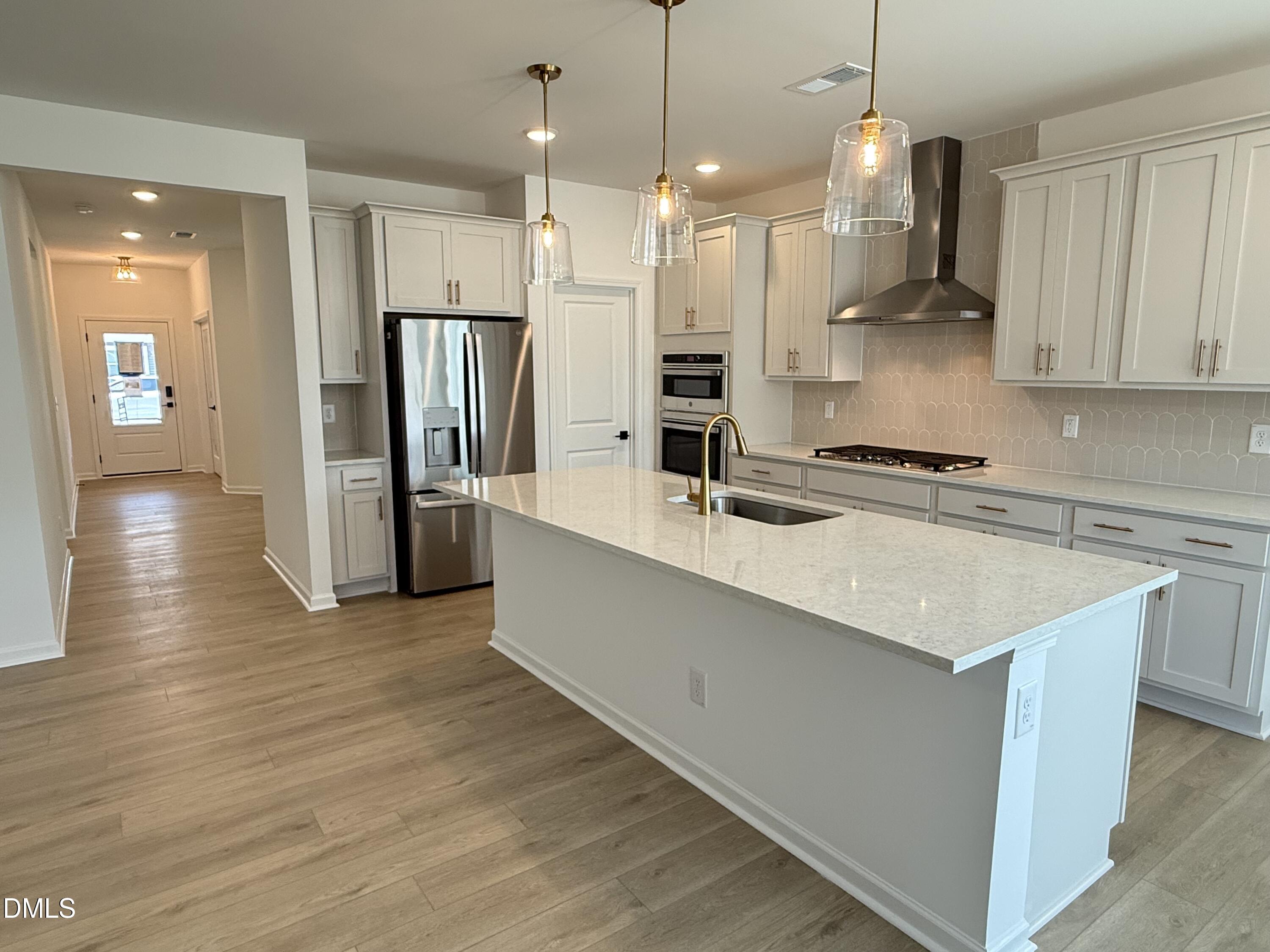940 Fetching Place, Unit 350 Rolesville, NC 27571 - Photo 11 of 15 Camden kitchen + foyer