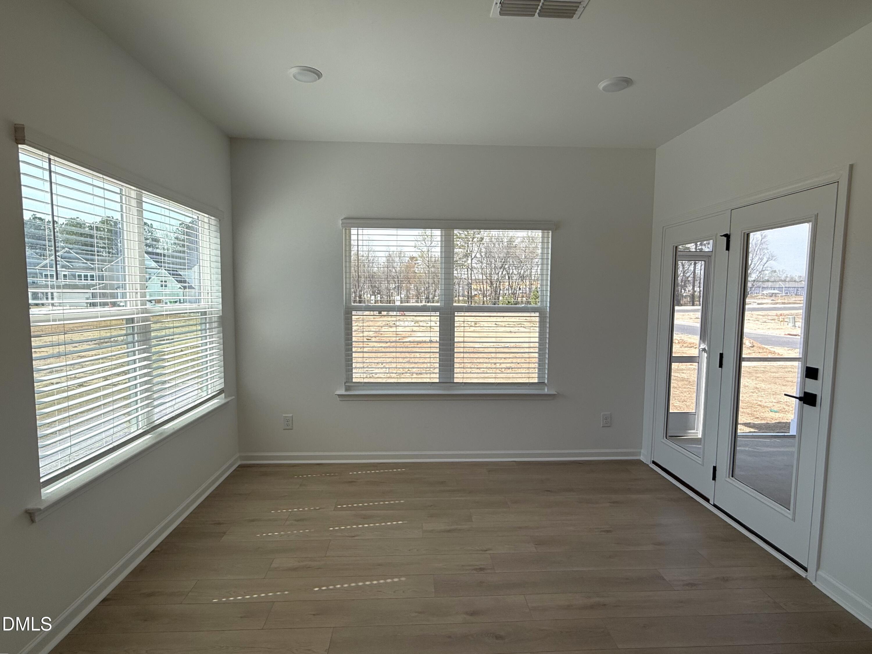 940 Fetching Place, Unit 350 Rolesville, NC 27571 - Photo 13 of 15 Camden breakfast nook to screened porch