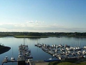 100 Cove Way, Unit 306 Quincy, MA 02169 - Photo 16 of 21 a view of a lake with houses