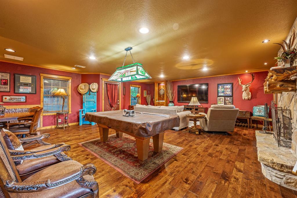 475 Magic Valley Bluff Dale, TX 76433 - Photo 20 of 40 a living room with lots of furniture and a table