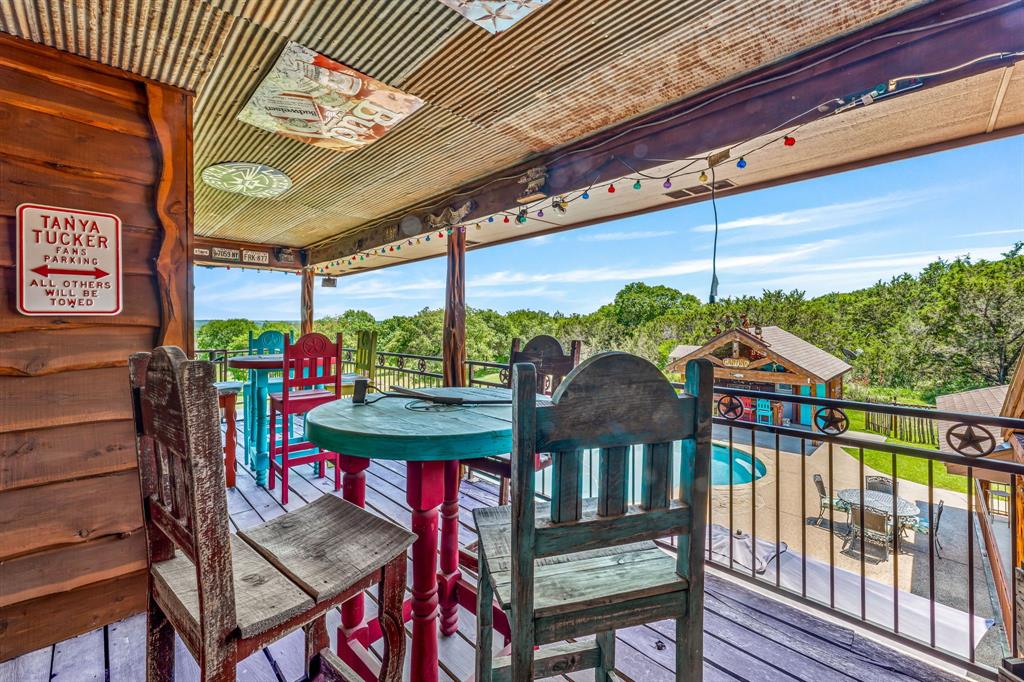 475 Magic Valley Bluff Dale, TX 76433 - Photo 27 of 40 a view of a chairs and table in patio with a barbeque