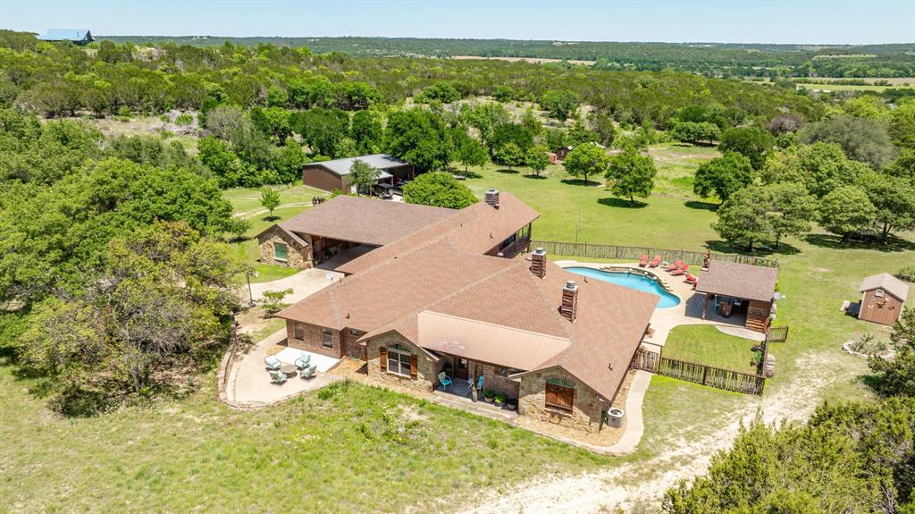 475 Magic Valley Bluff Dale, TX 76433 - Photo 3 of 40 an aerial view of a house with a yard